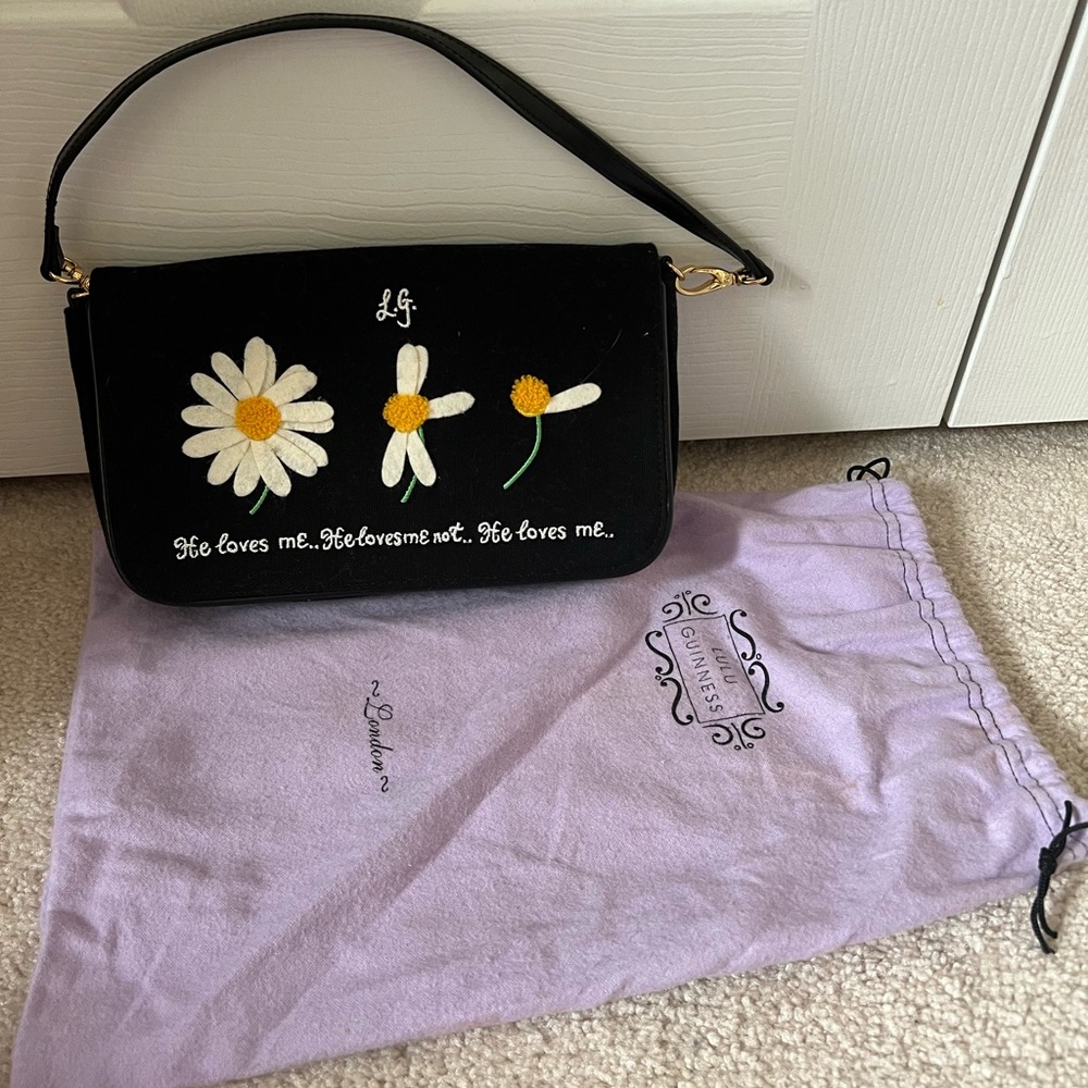 Lulu Guinness embroidered clutch bag.